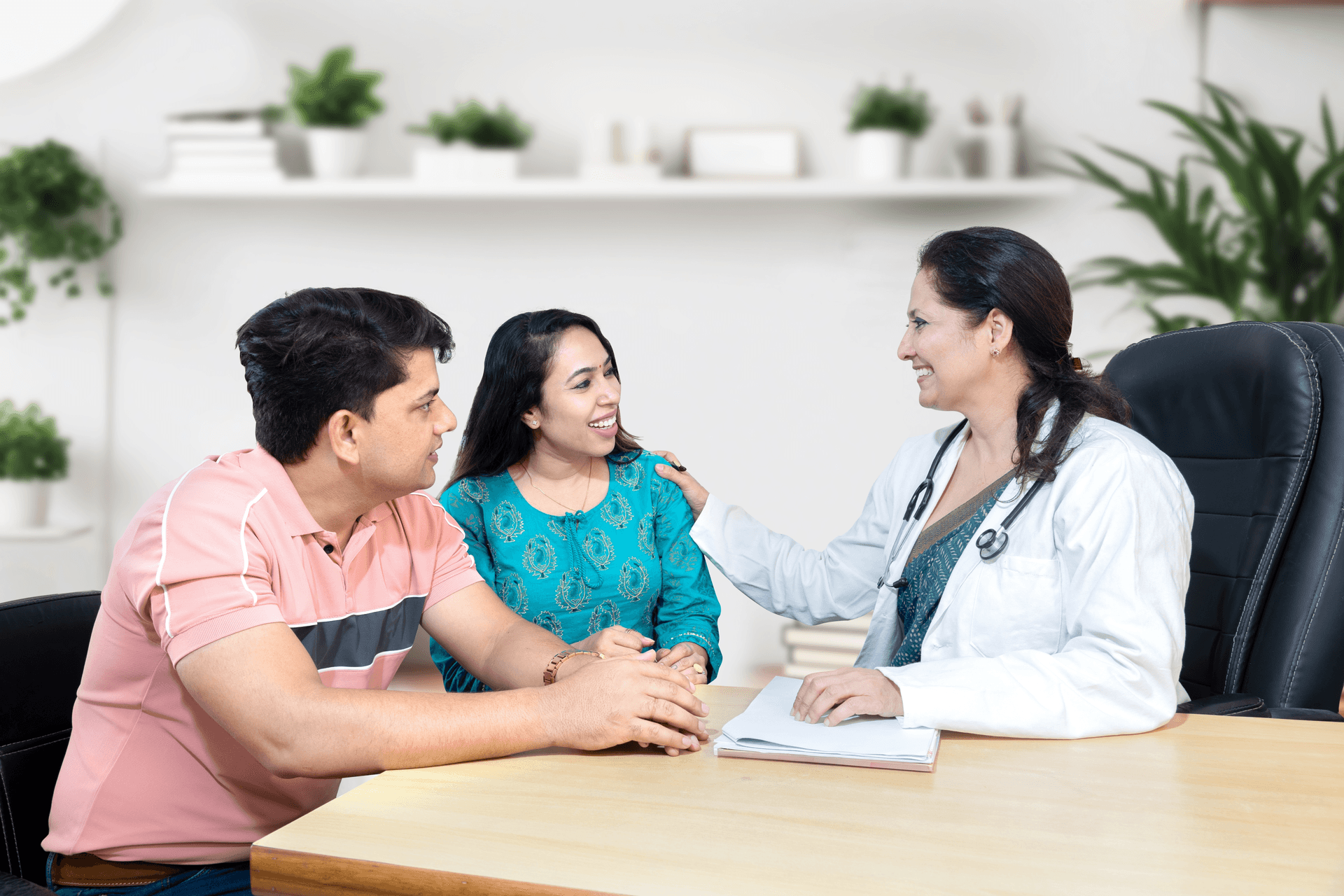 Doctor consulting couple